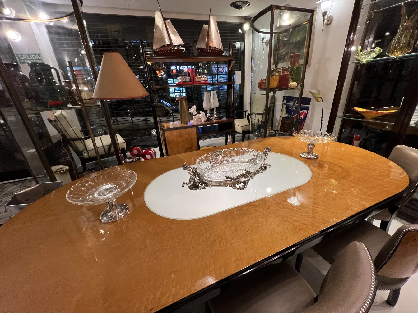 antique centerpiece Christofle on table with decorative dishes and lamp