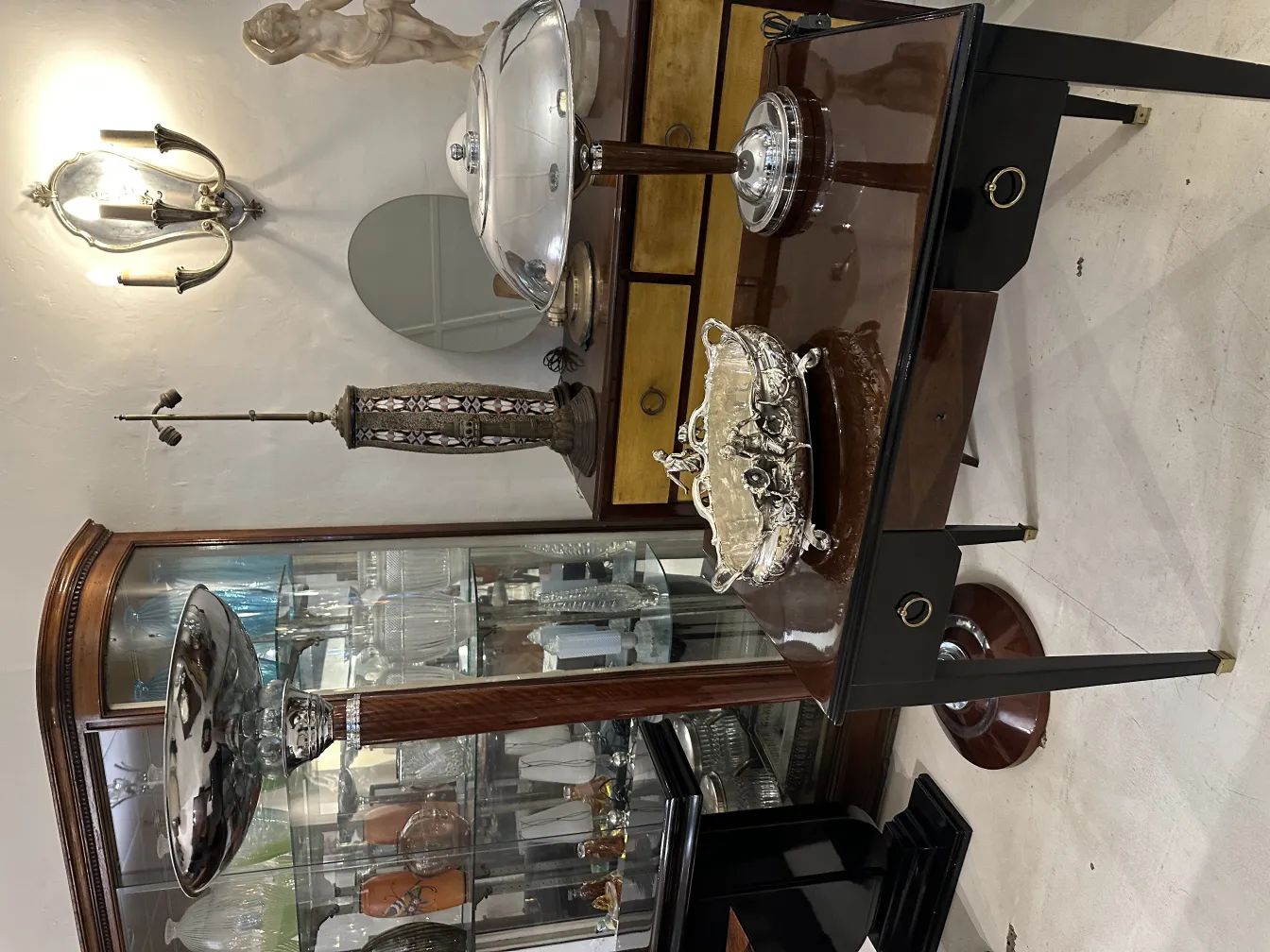 decorative antique planter on an elegant table with accessories