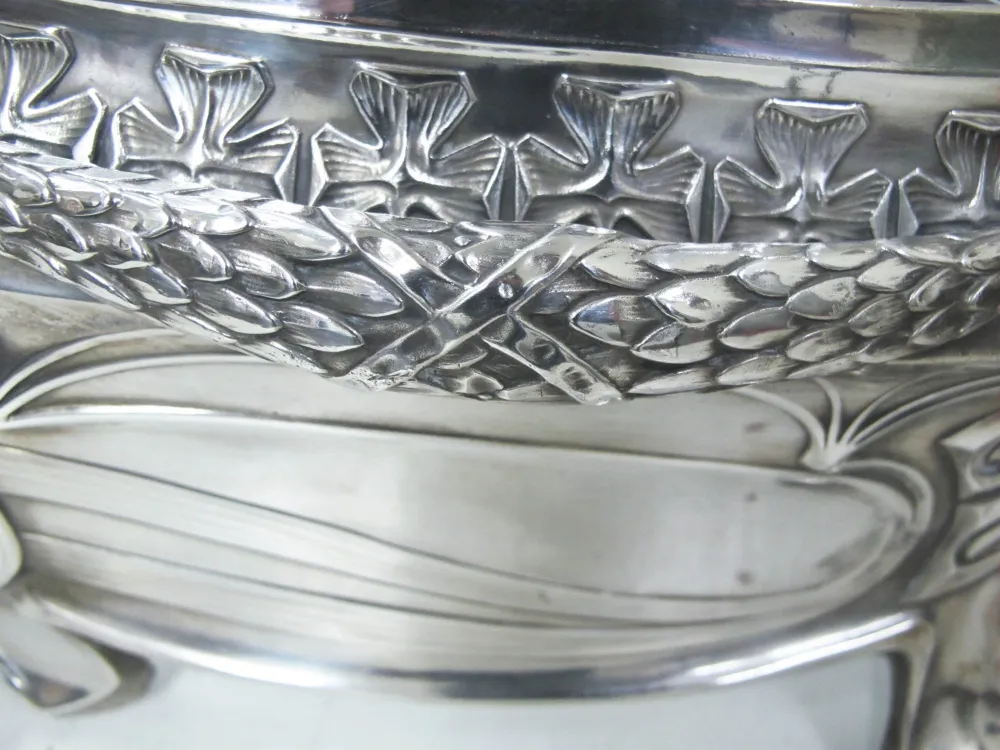 antique WMF centerpiece with intricate floral designs