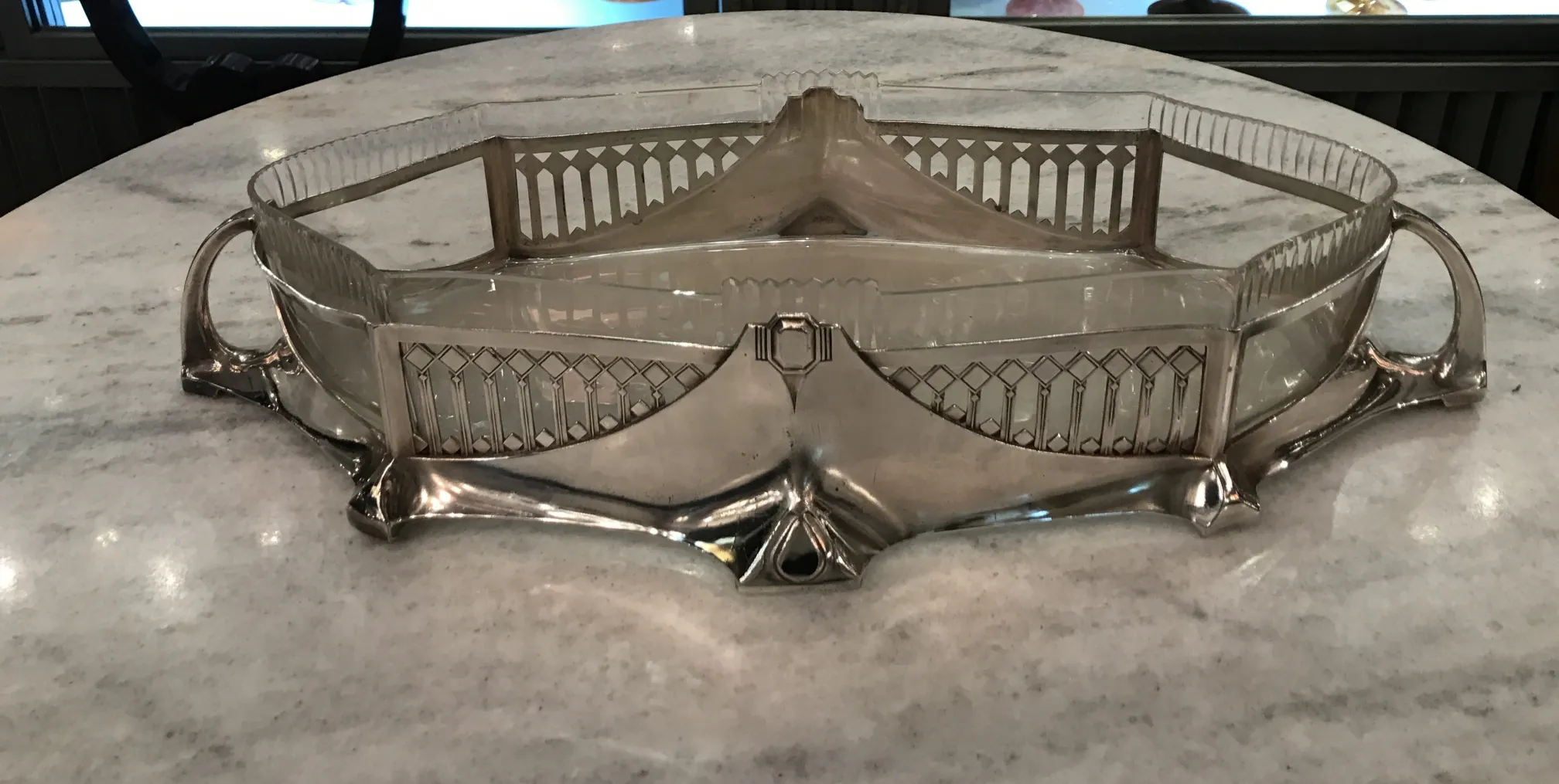 antique centerpiece with decorative design and visible details
