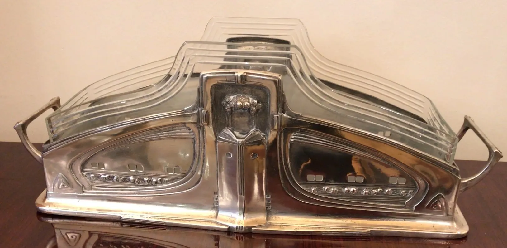 Antique WMF centerpiece with decorative details and stylized design