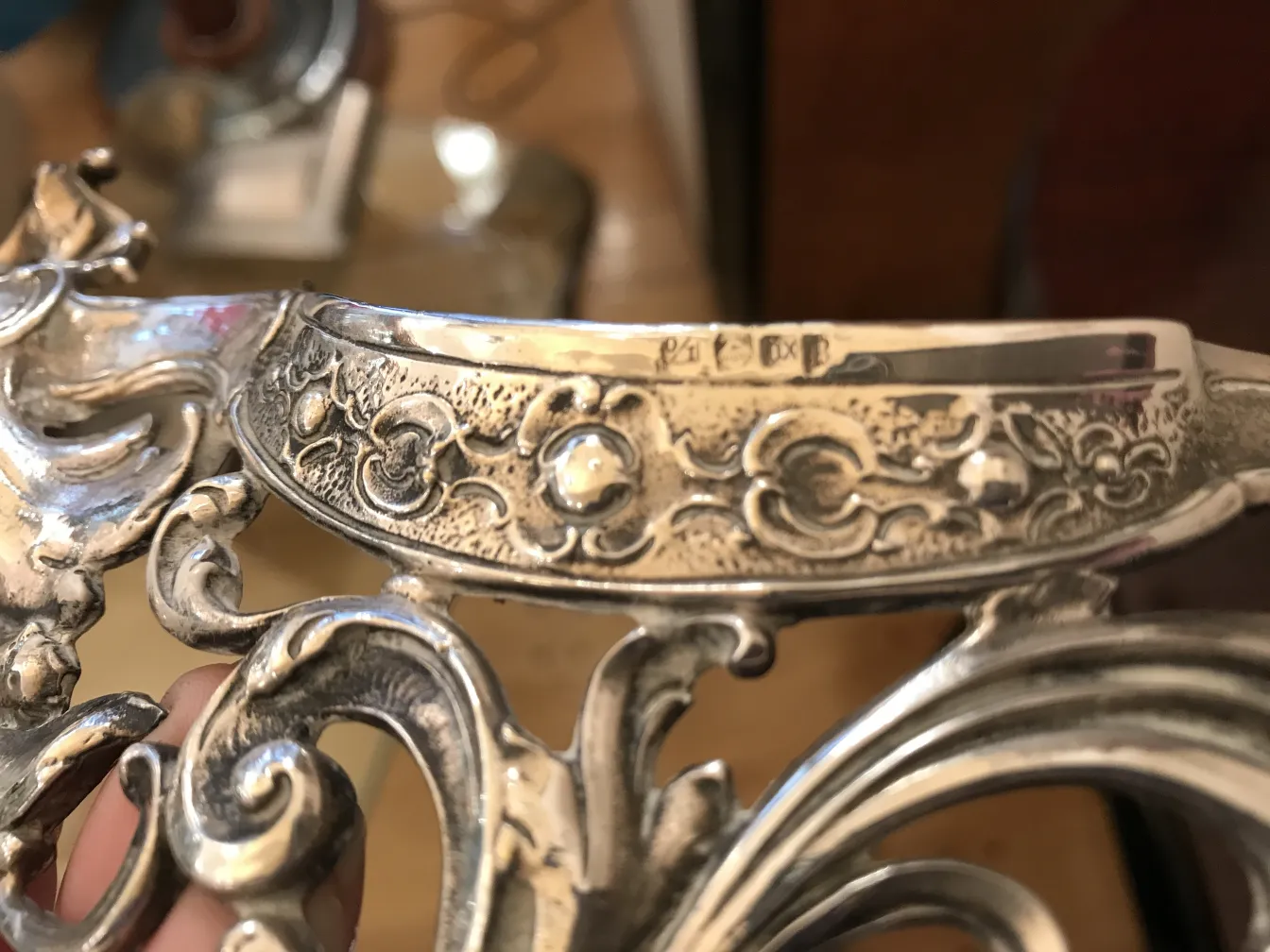 antique WMF centerpiece with floral details, perfect for table decor