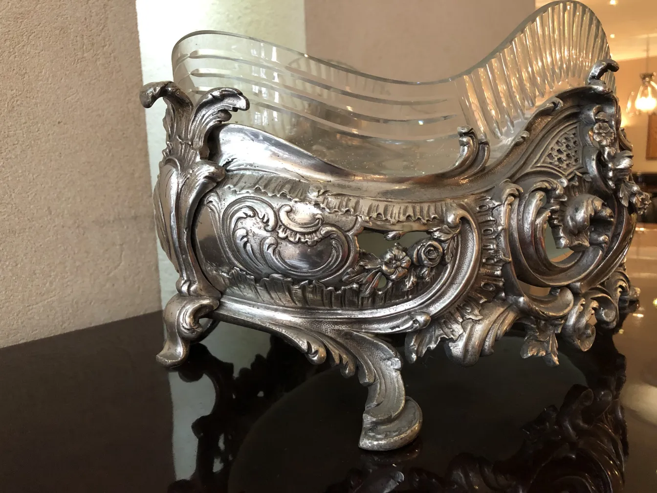 antique WMF centerpiece with floral design and curved shape, elegant