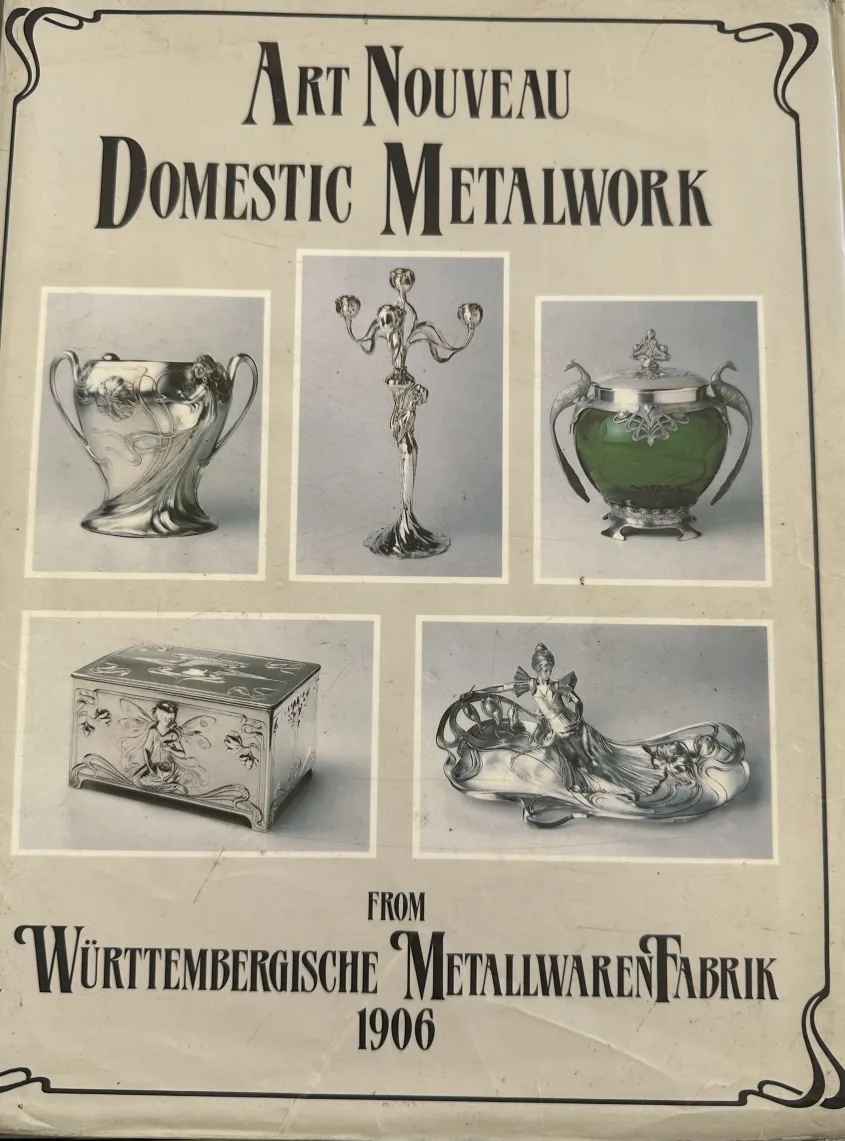 wmfb antique centerpiece with decorative details in an elegant setting