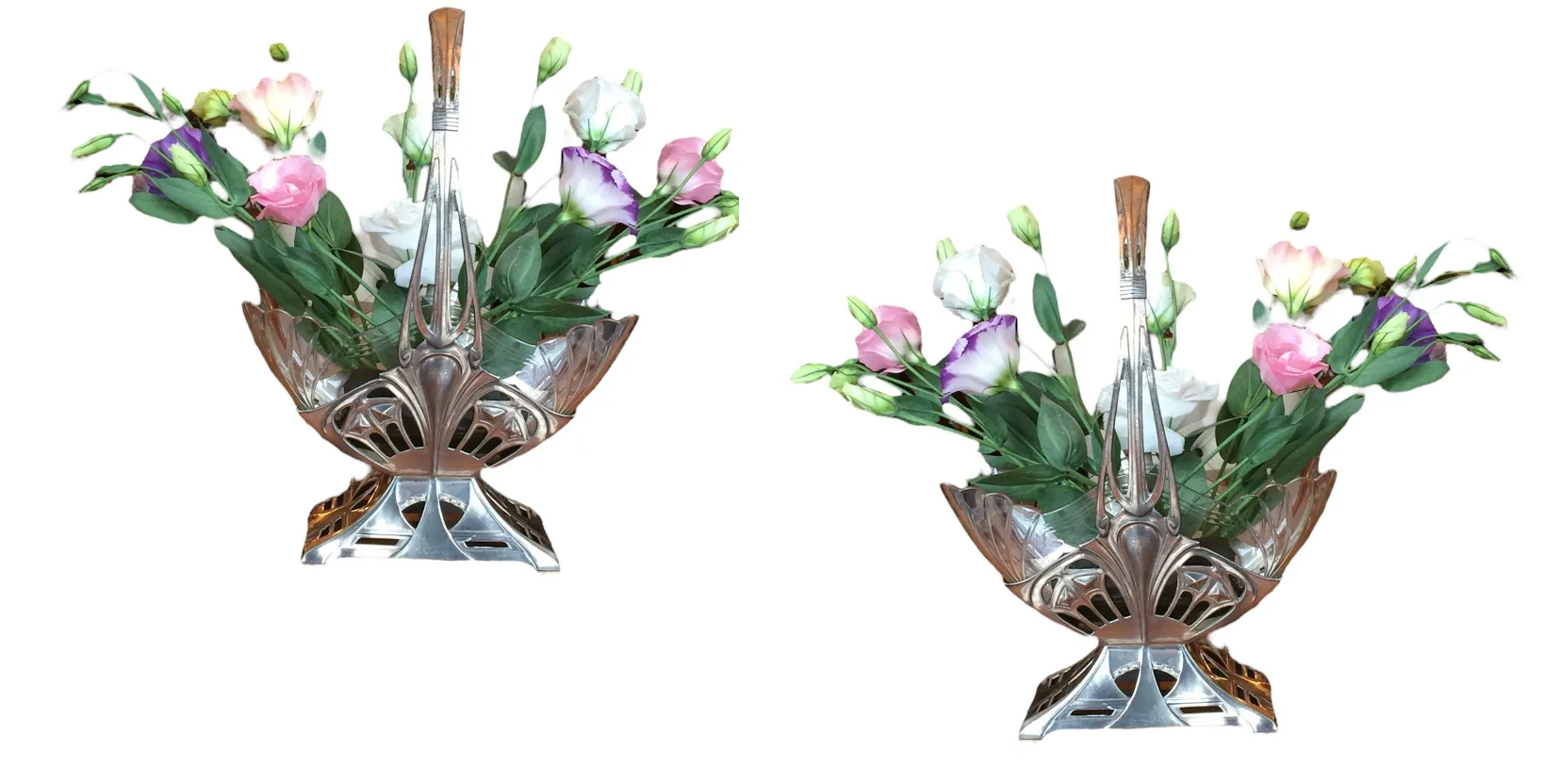 jardinera antigua WMF con flores de colores rosa y blanco en un entorno elegante.