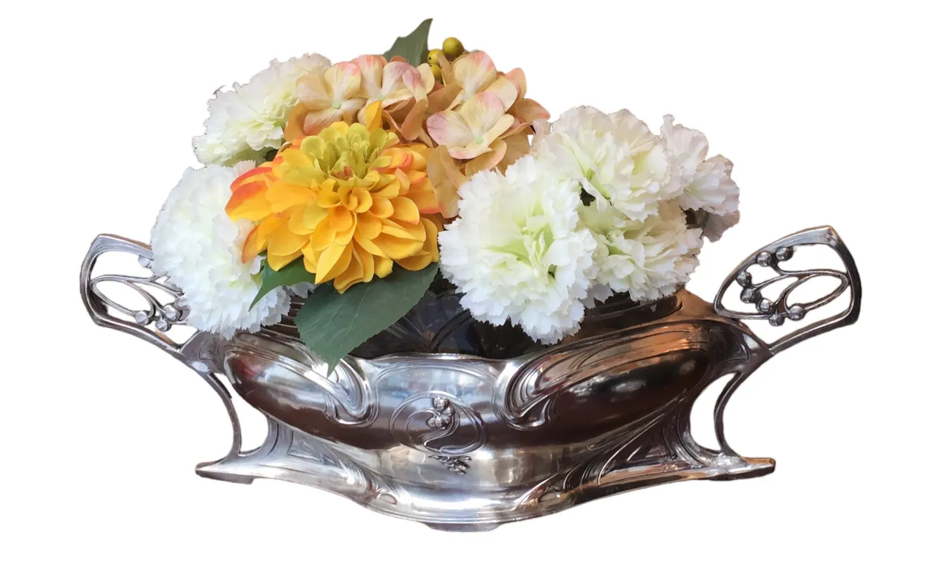 Antik WMF Blumentopf mit einer Mischung aus warmen und kalten Blumen.