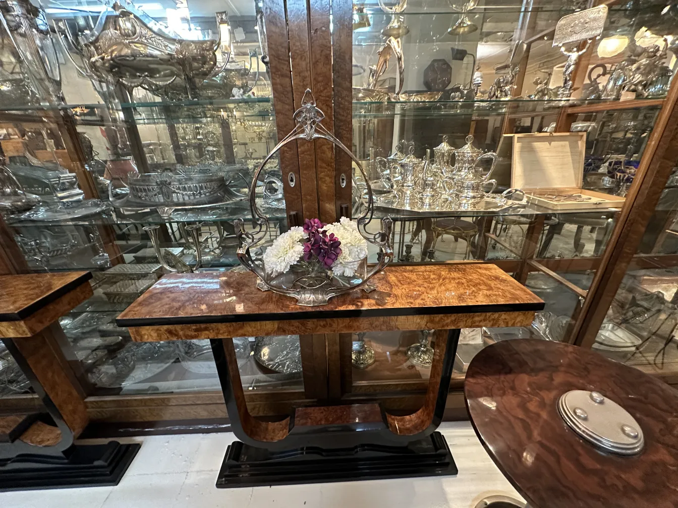 WMF centerpiece decorated with flowers in an antique setting