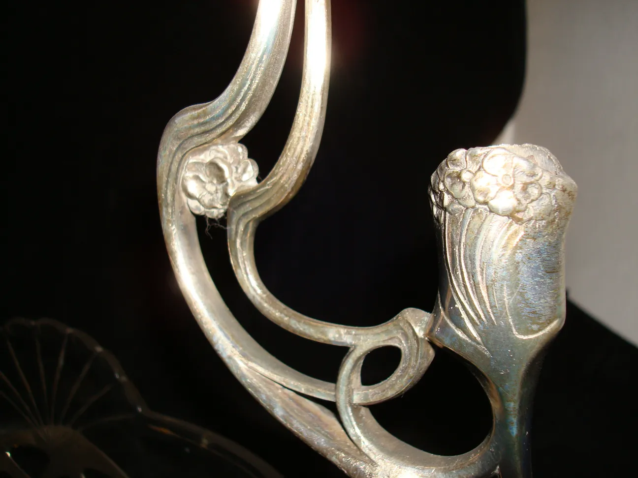 wmfc antique centerpiece with decorative details and flowers