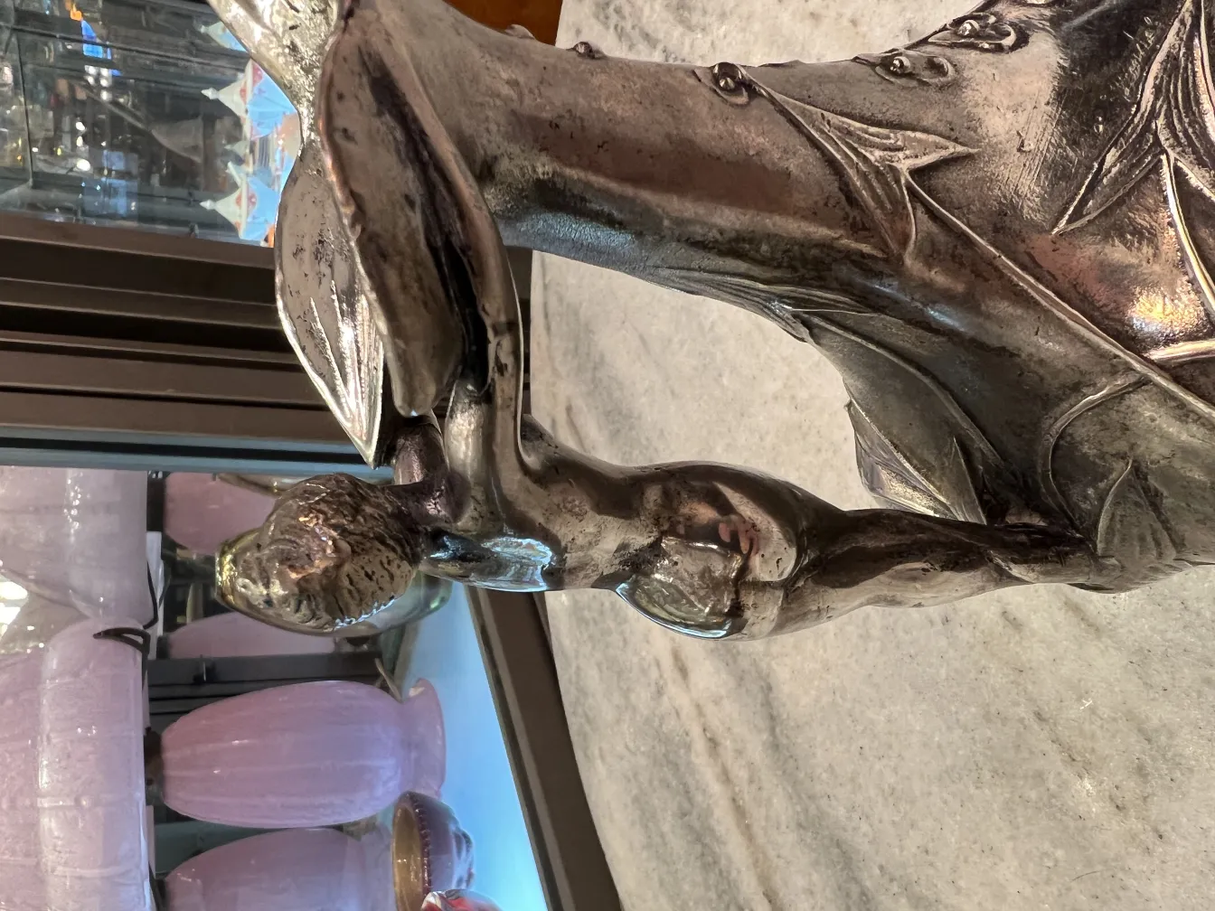 antique jar with ornamental detail and stylized shape