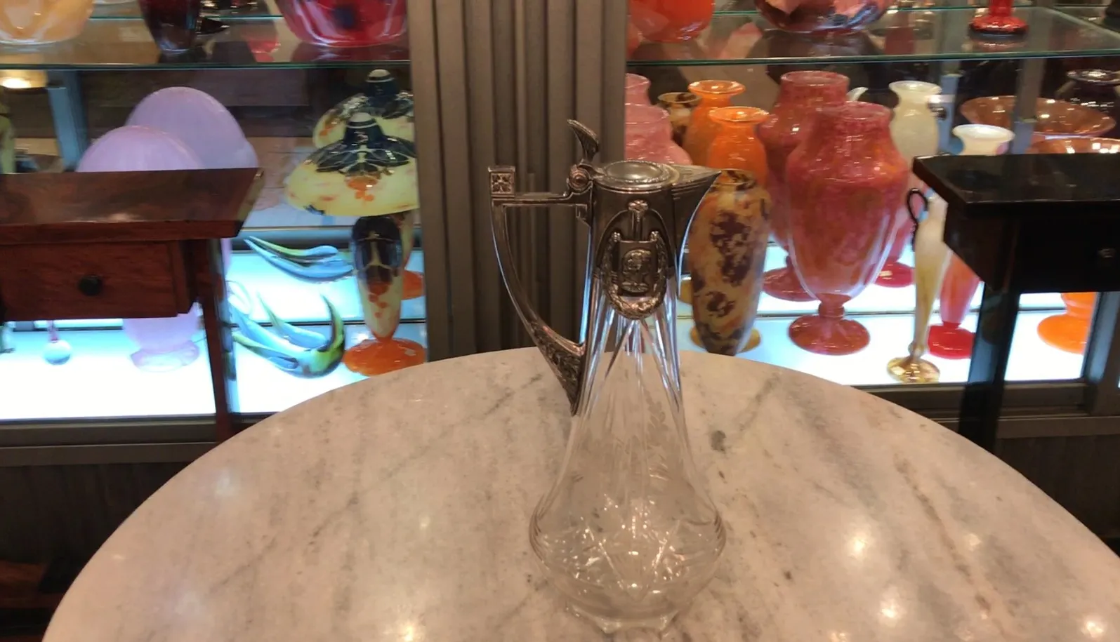 two antique WMF jars on a marble table
