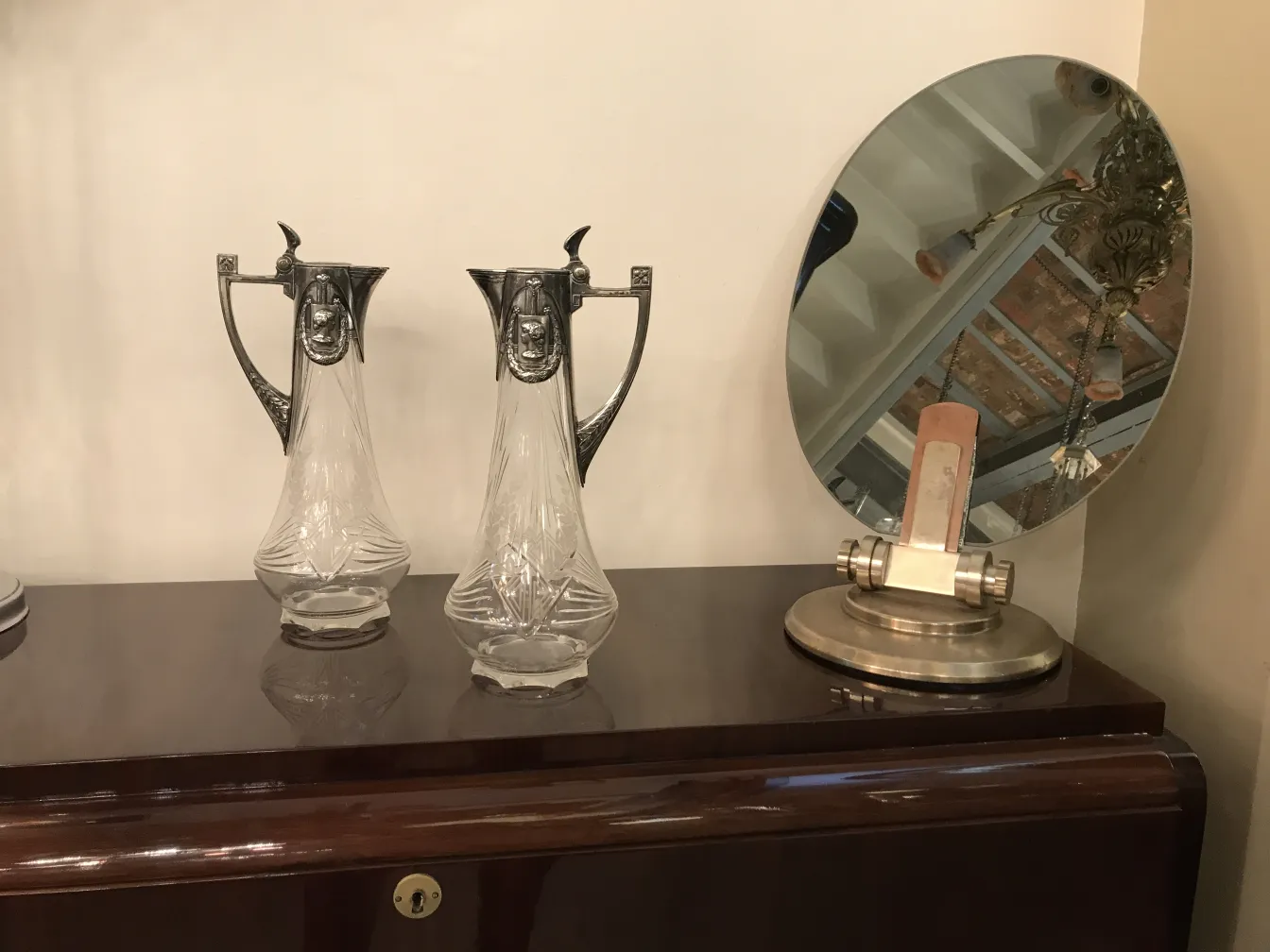 two antique WMF jars with attractive design in an elegant setting