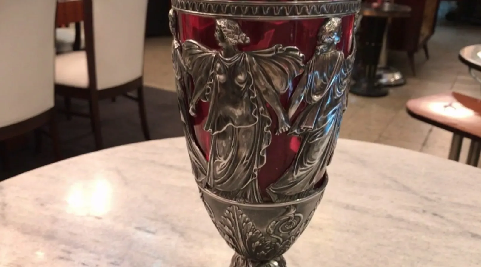 antique jars WMF with sculptural design and vibrant colors, surrounded by a cozy setting