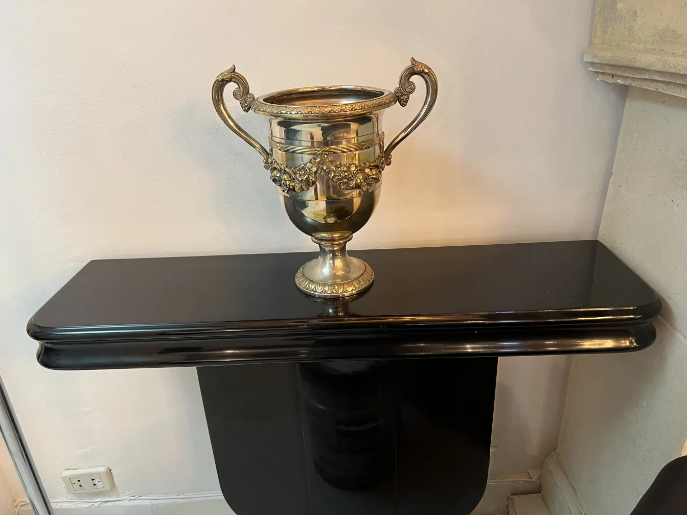 Antique champagne cooler wmf with decorative details on a light background