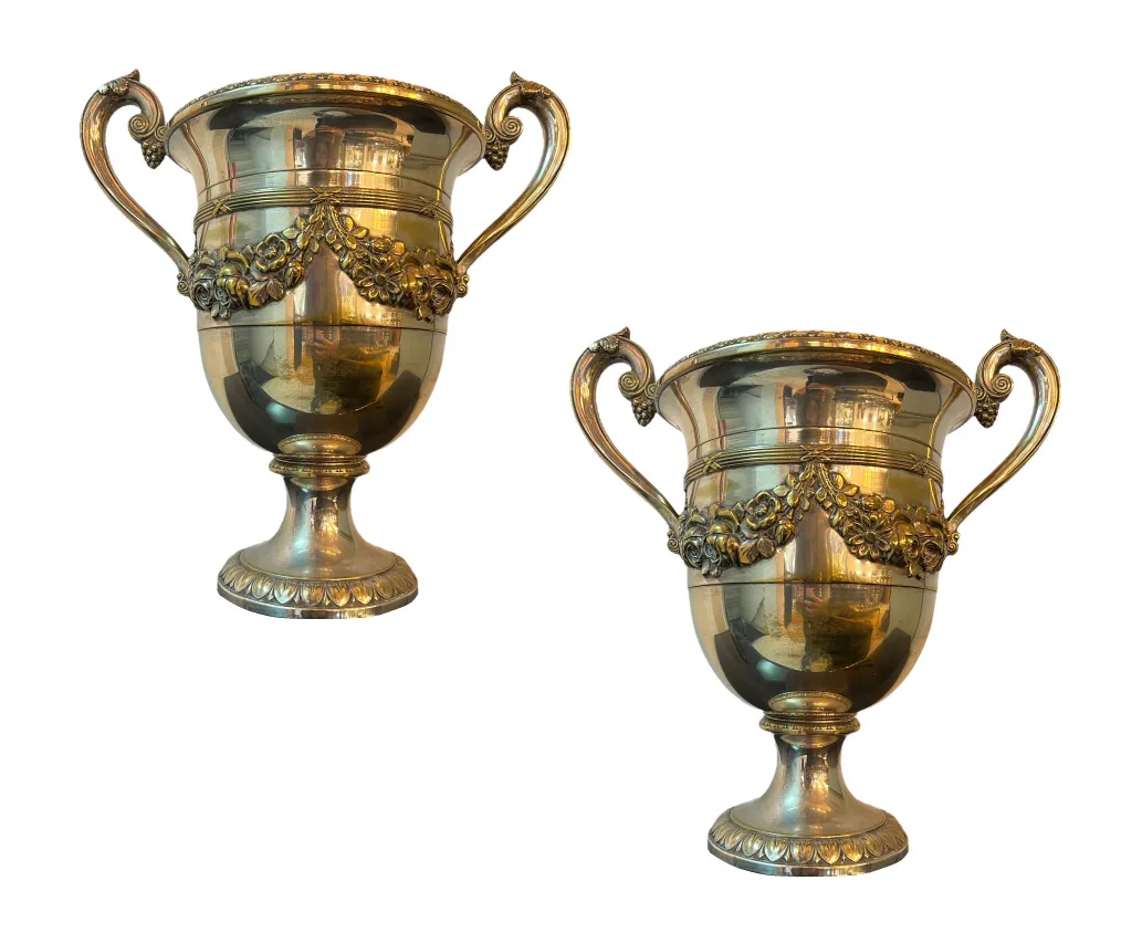 2 antique champagne coolers with elegant design and decor
