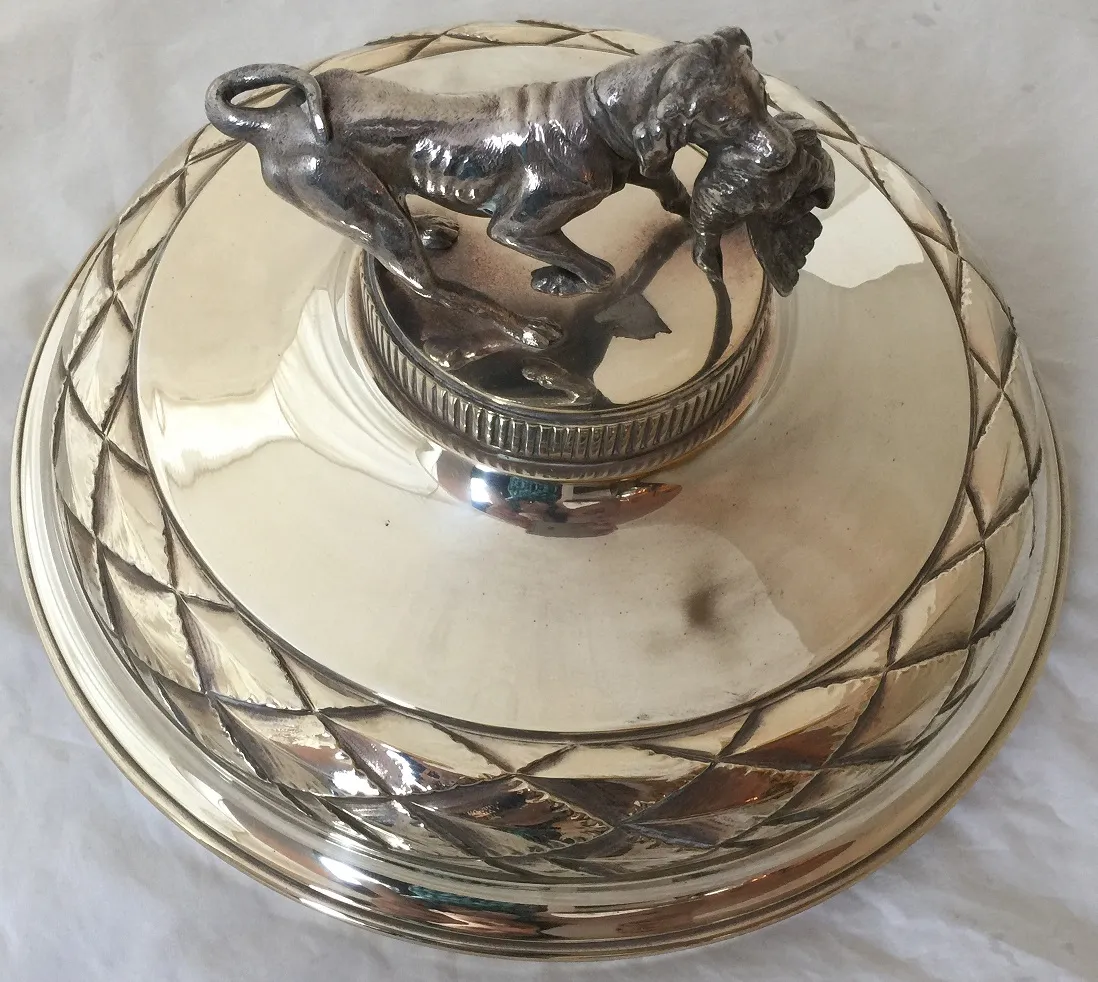 Top view of 2 antique champagne coolers wmf featuring a lion on the lid.