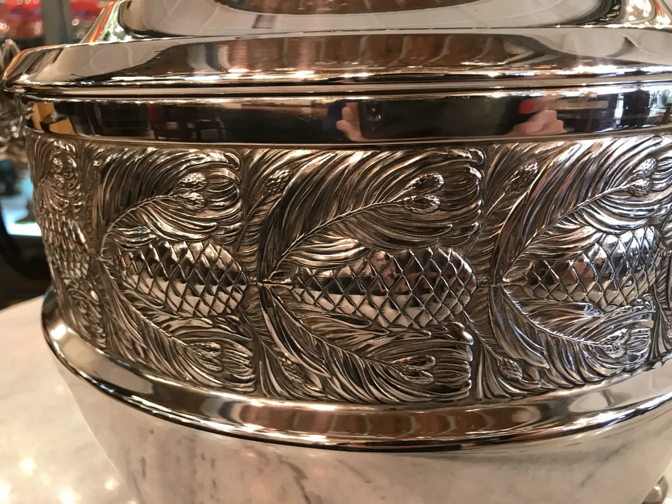Antique WMF punch bowl with decorative design on the rim.