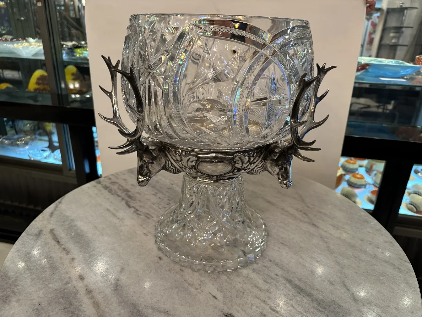 antique wmff punch bowl with intricate design and deer details