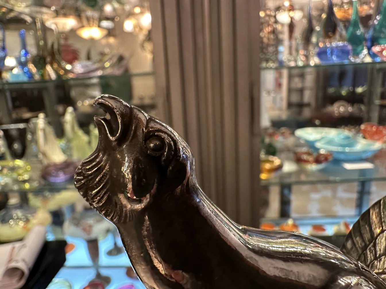 antique WMF punch bowl featuring a fish design at the top