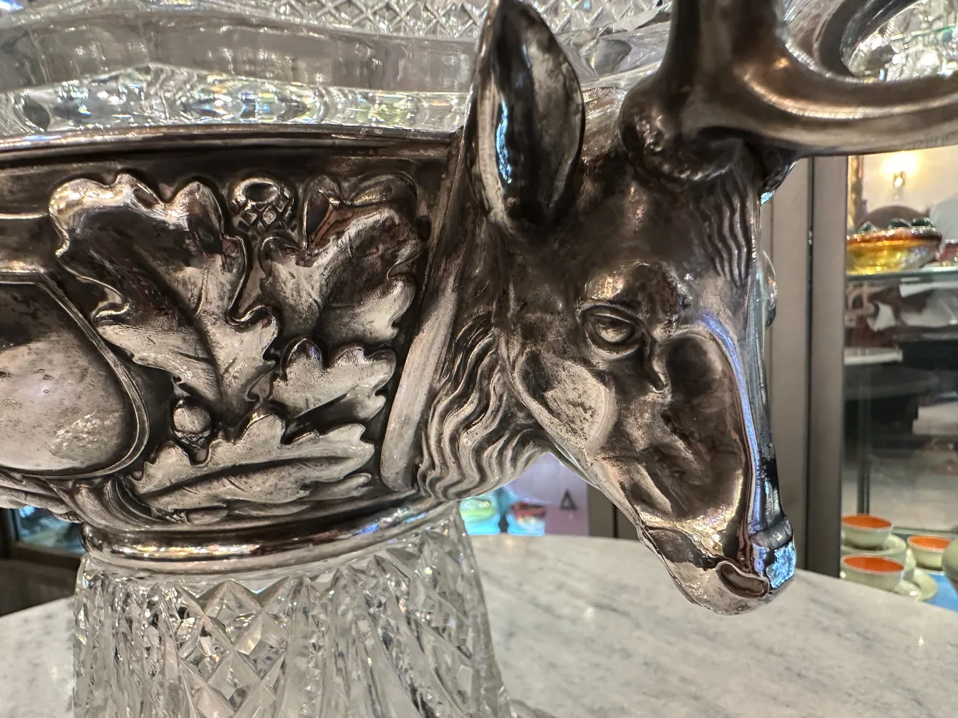Antique WMF punch bowl with deer and leaf relief details