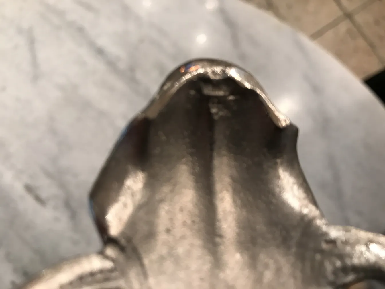 antique WMF punch bowl featuring a round base and elegant design