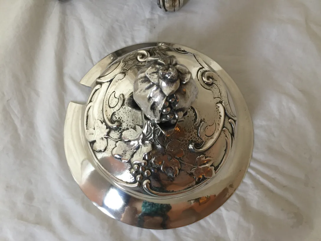 antique WMF punch bowl decorated with floral motifs and detailed lid