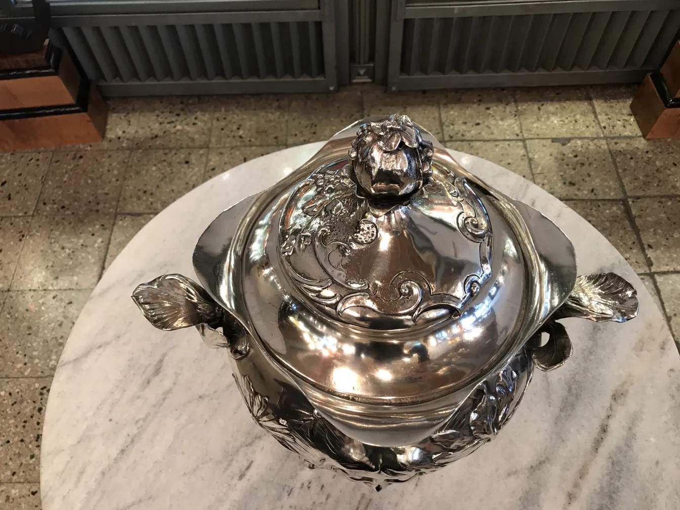 Top view of an antique WMF punch bowl with floral decorations