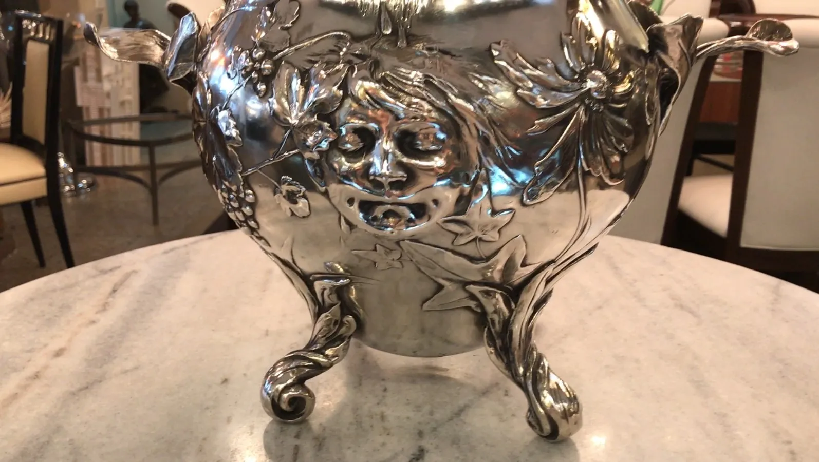 Antique WMF punch bowl with curved feet and artistic floral design