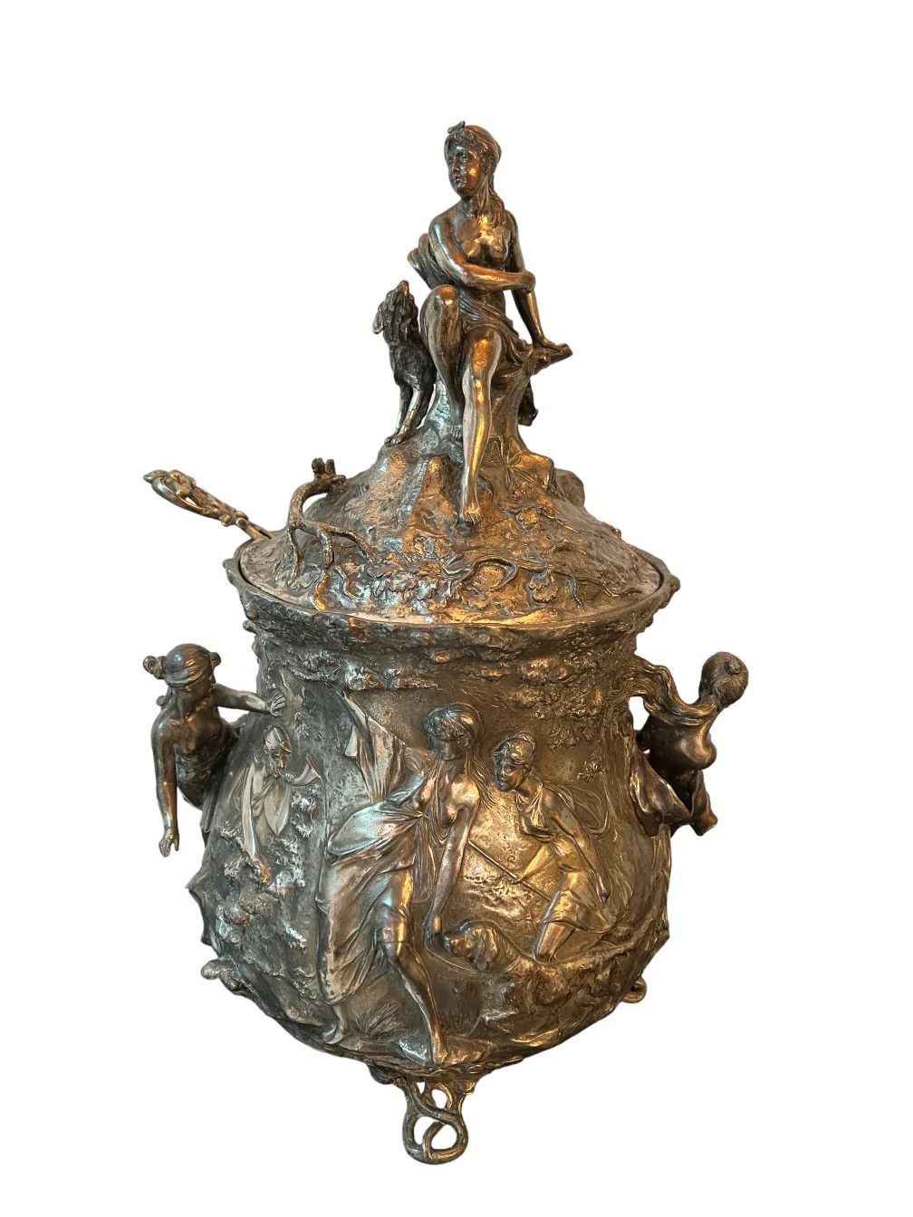 Side view of the antique WMF punch bowl with detailed figures.