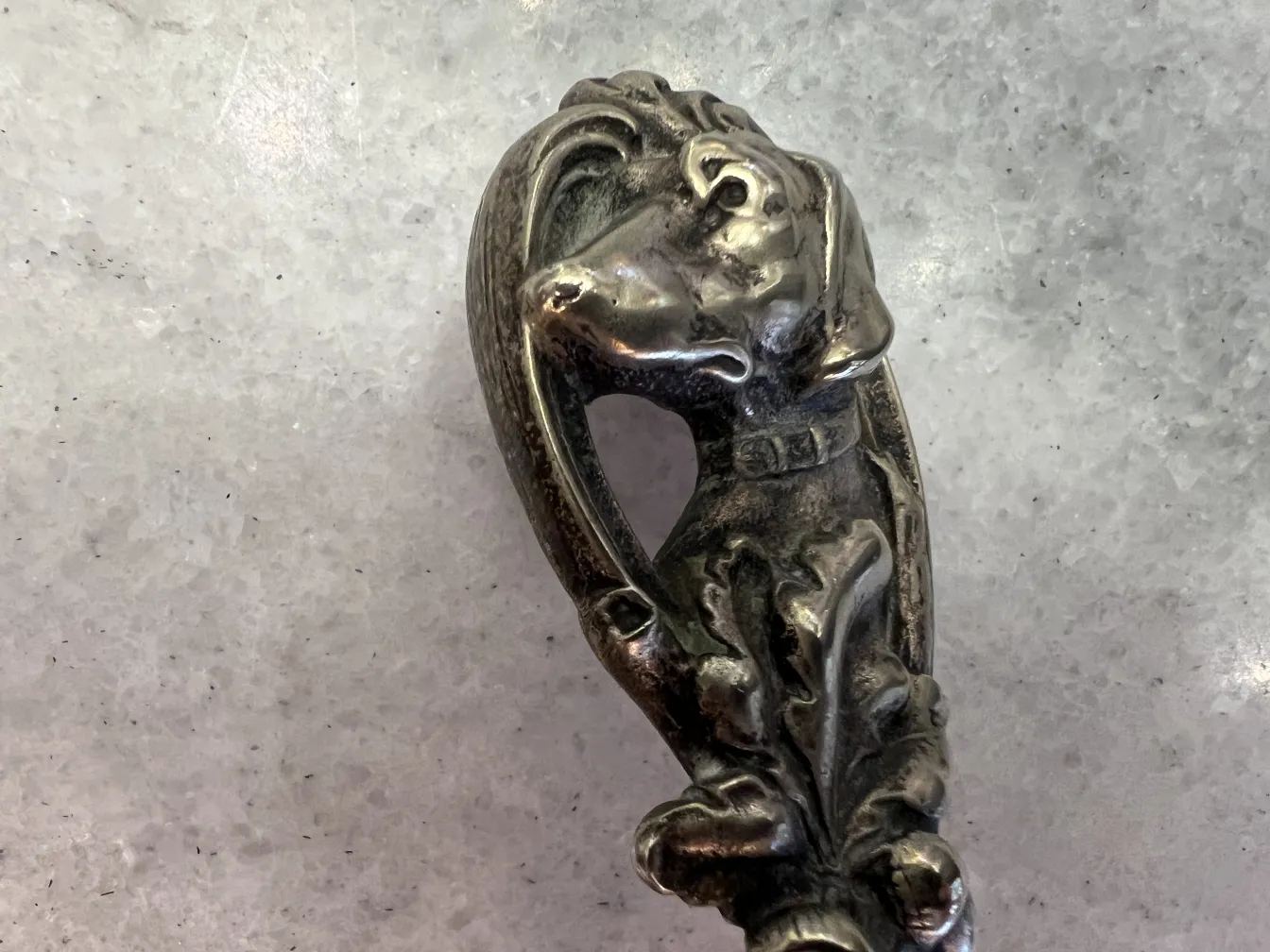 antique wmfs punch bowl featuring a carved dog head