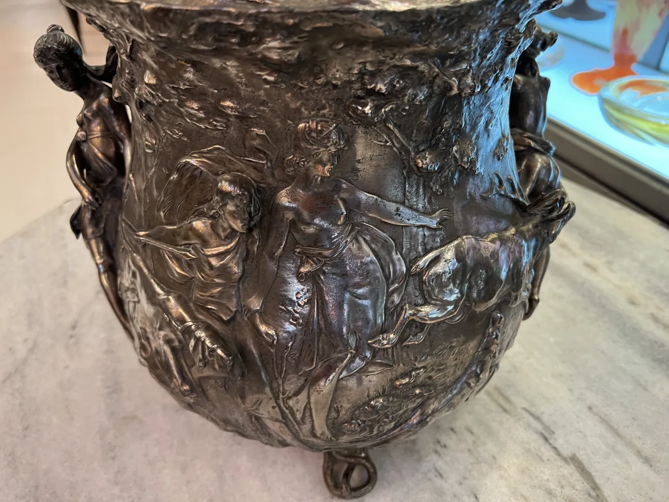antique wmf punch bowl featuring elaborate shape and relief decorative figures