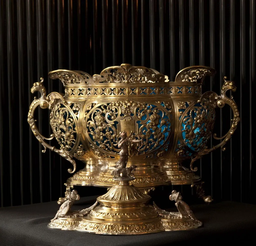 antique wmf punch bowl with intricate details and colors