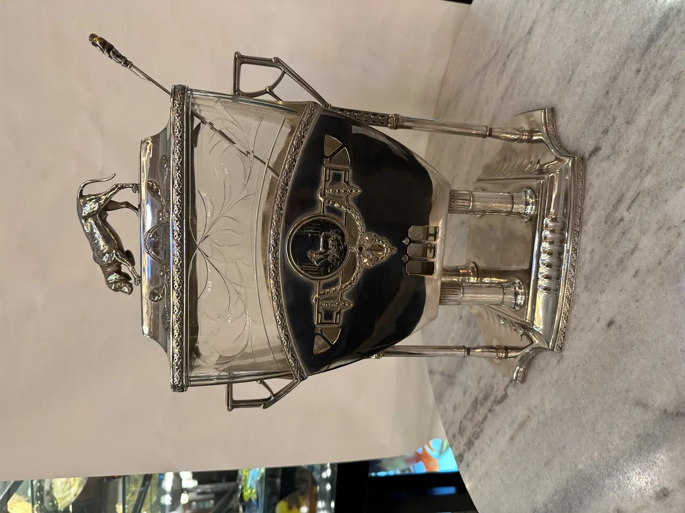 Antique WMF punch bowl with elegant design and embellishments.