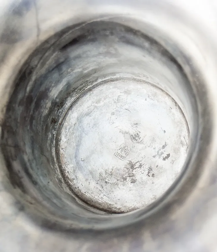 Interior of an antique Orivit vase with subtle details.