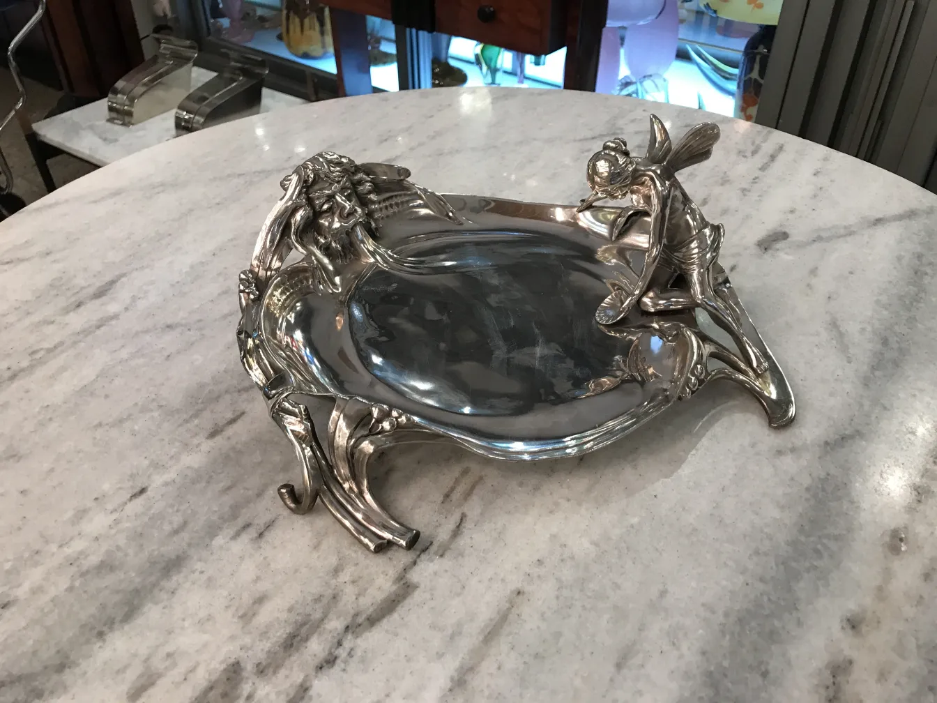 Antique WMF card tray featuring intricate design and decorative details.