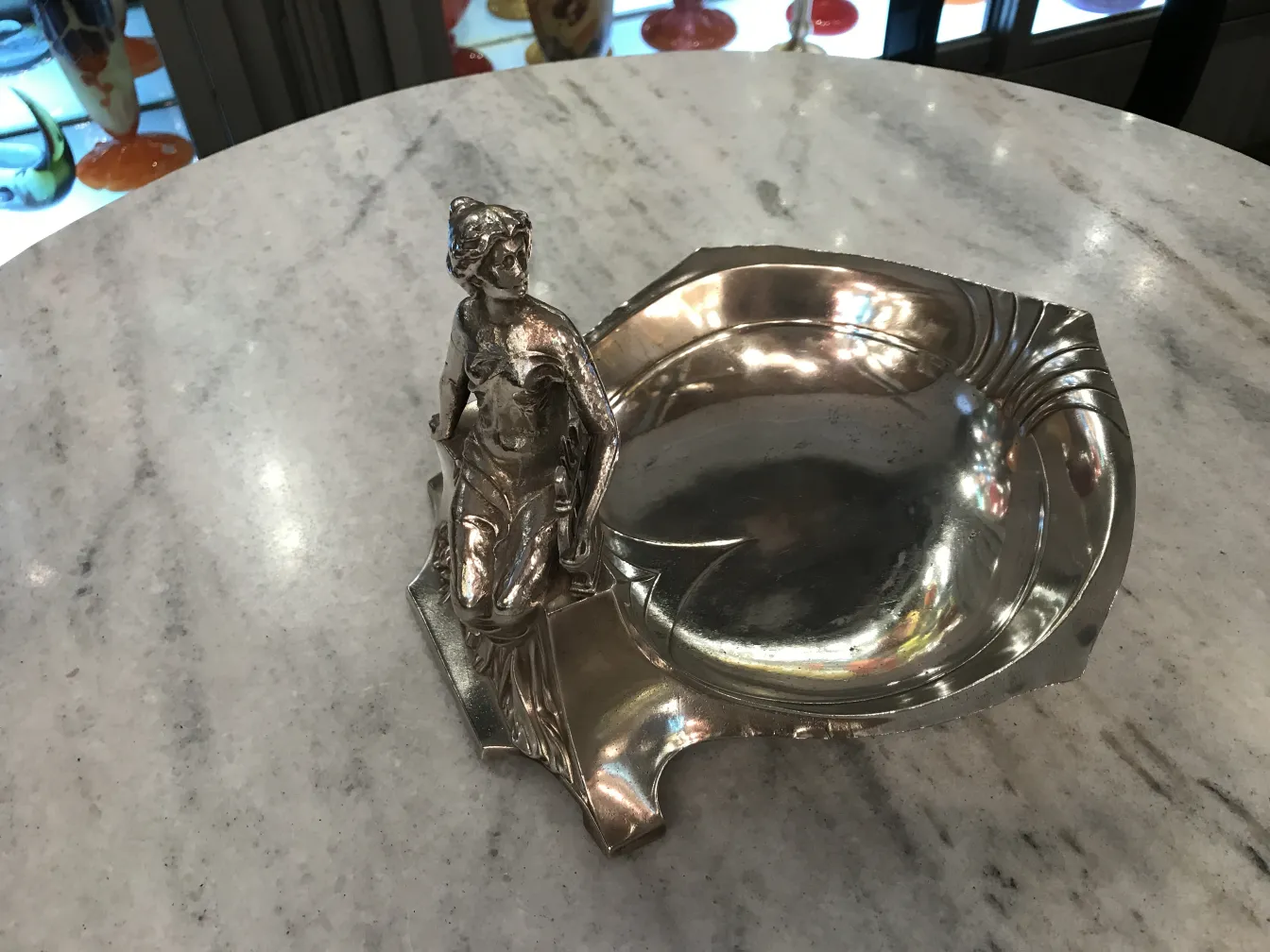 antique card tray with decorative figure