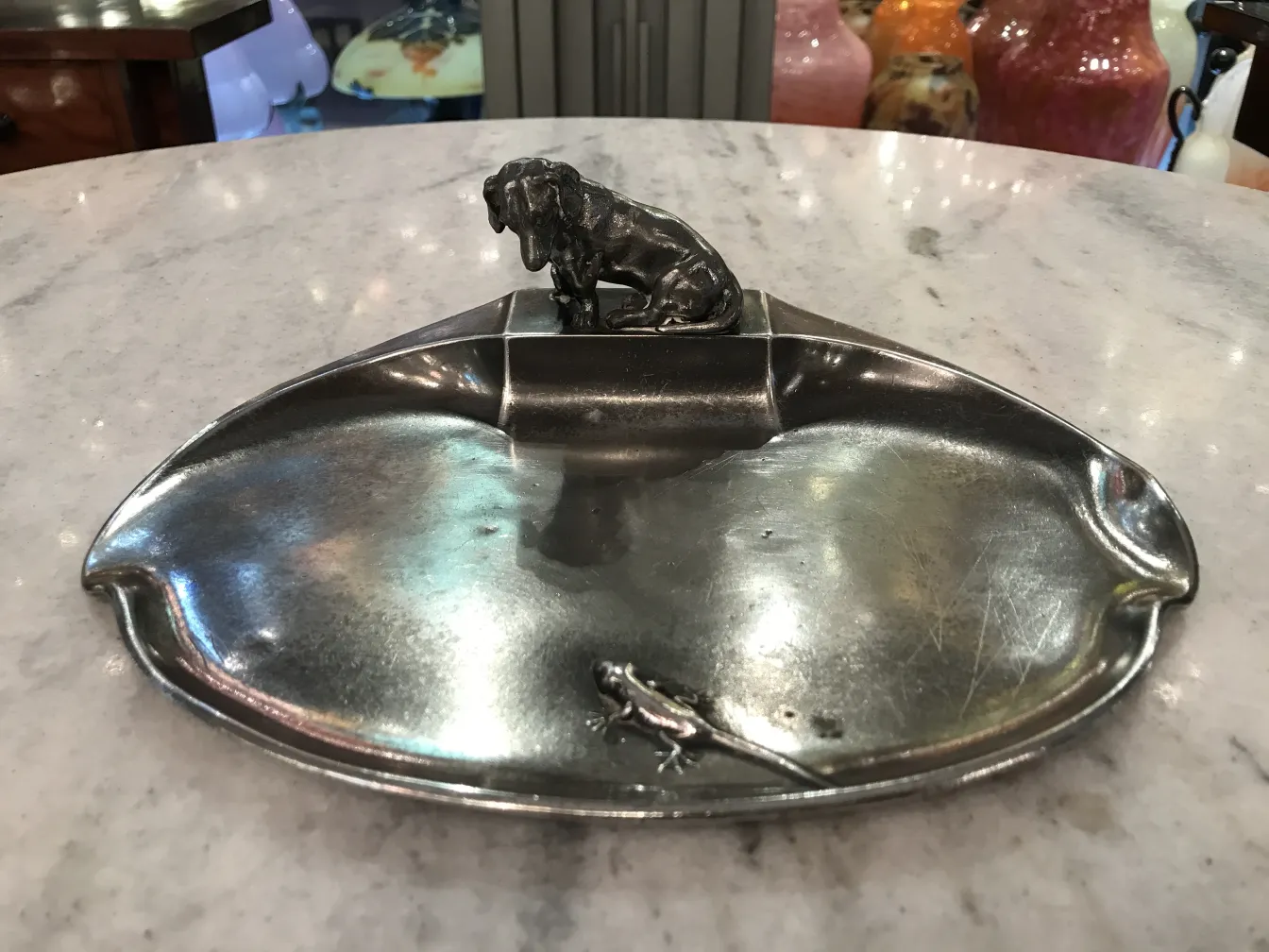 antique WMF card tray featuring a dog figure