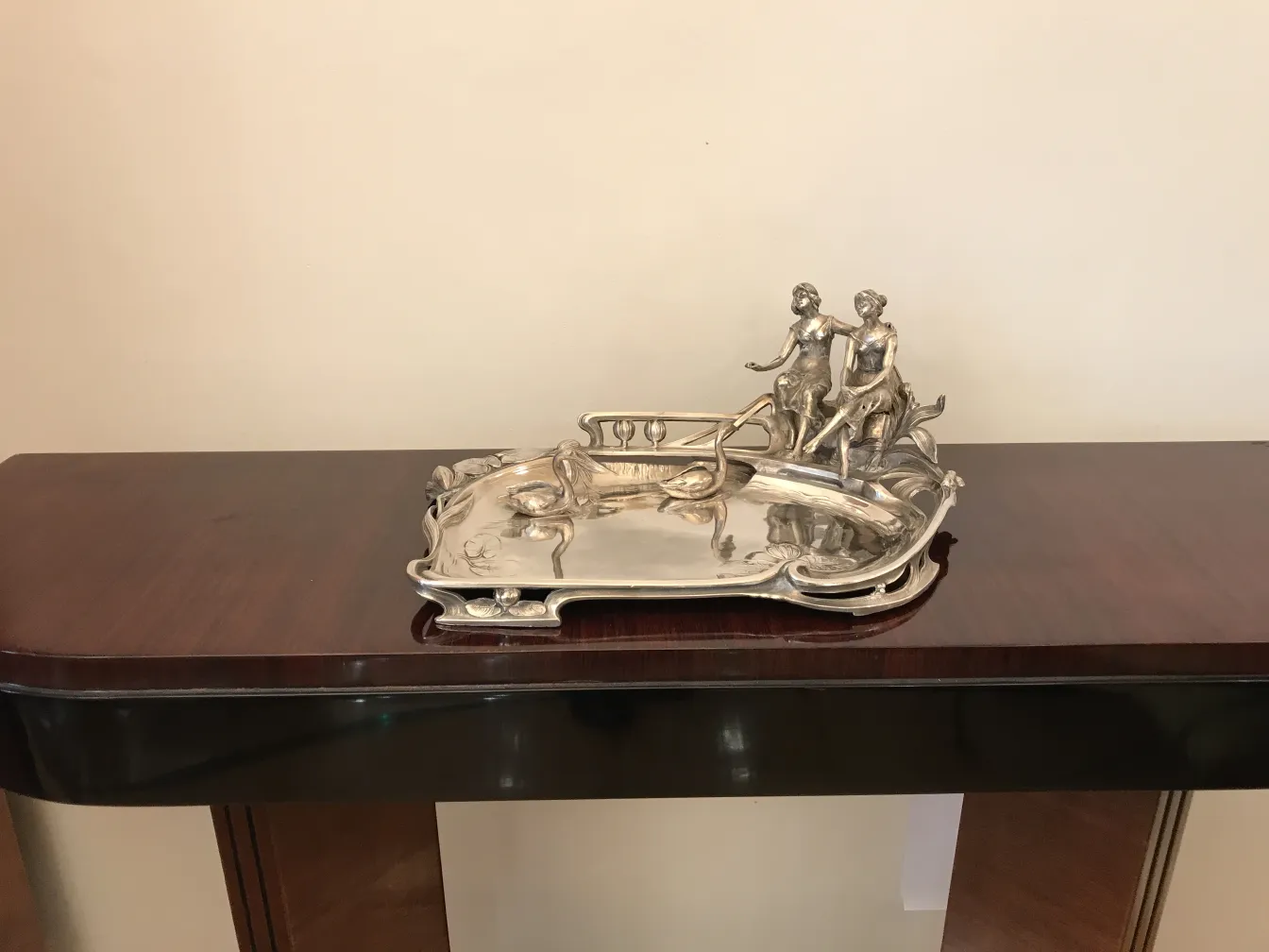 card tray featuring antique figures on the edge