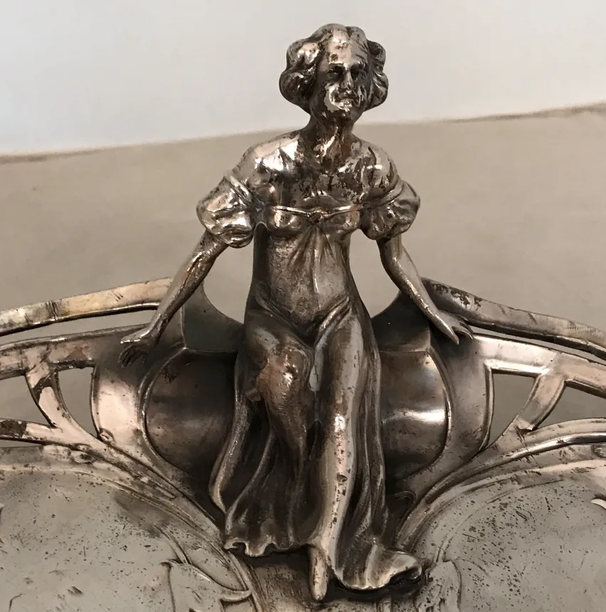 Antique WMF card tray with decorative seated figure