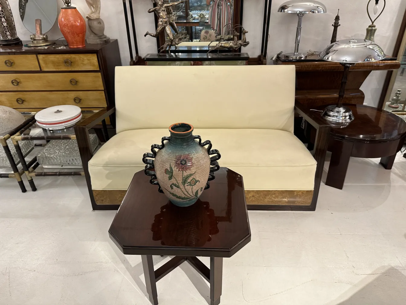 antique white armchair with floral decoration, in elegant setting