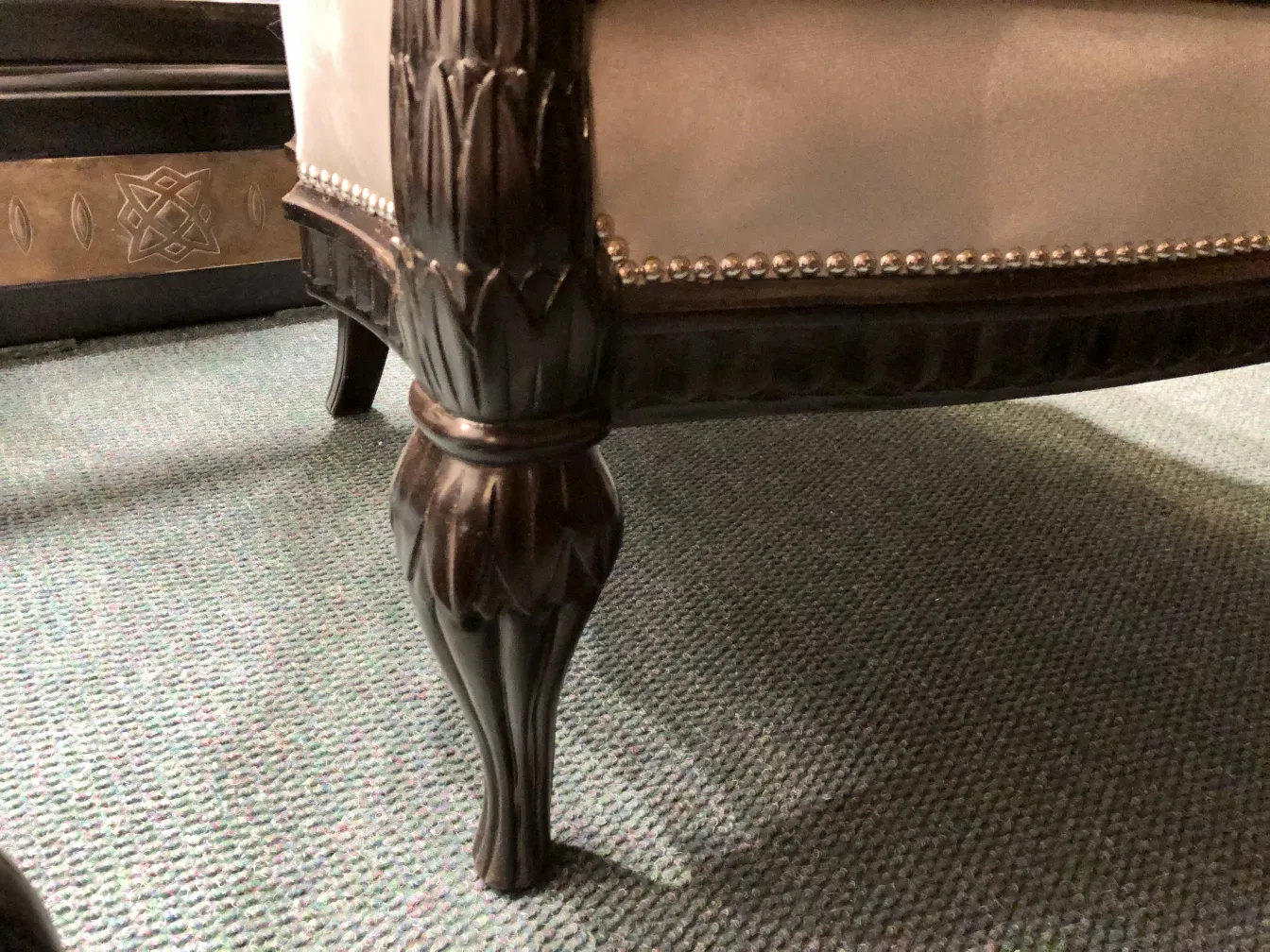 tre poltrone antiche con gambe decorative di paul follot