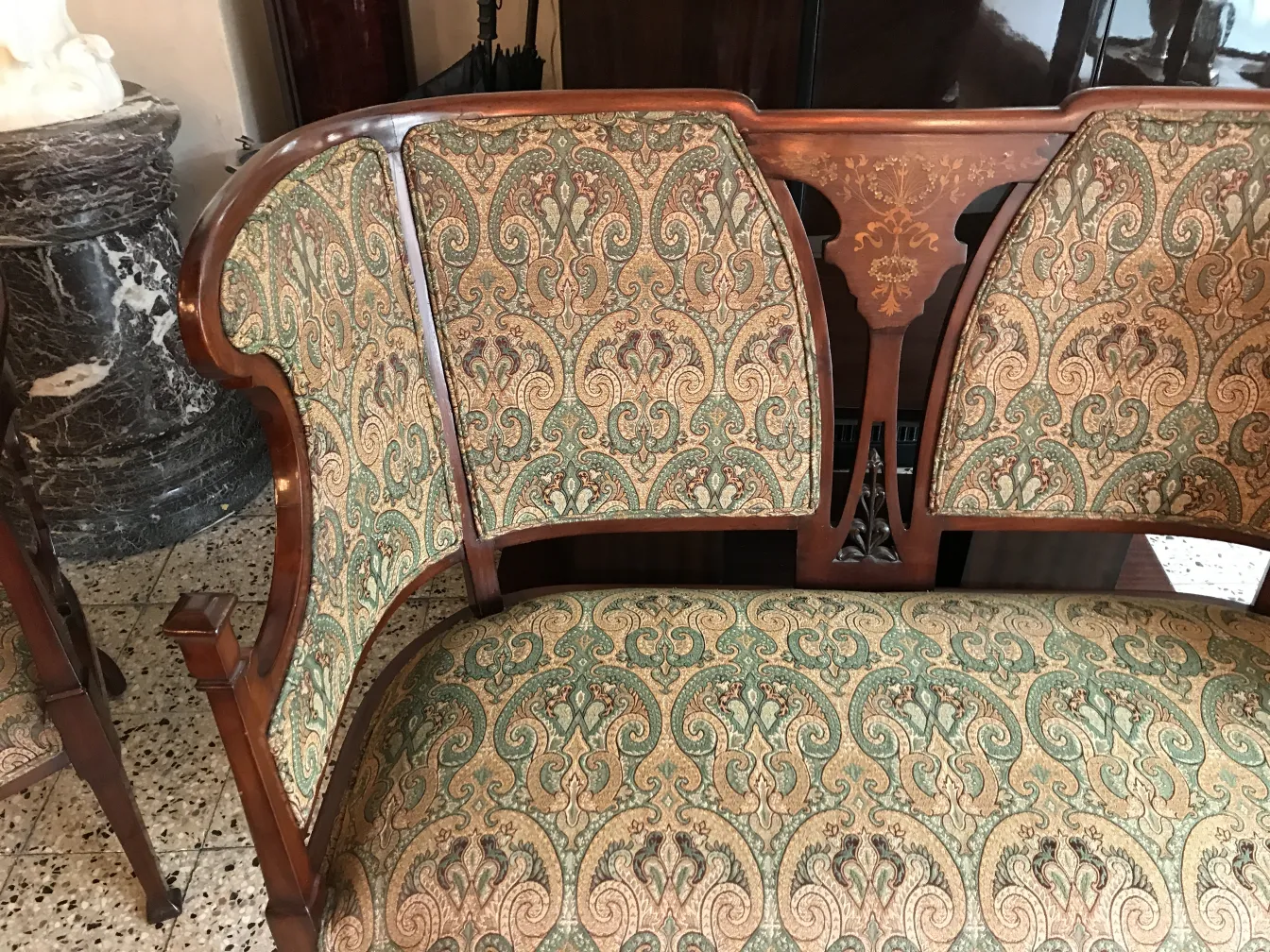 Antique set of 3 armchairs and 4 chairs in art nouveau style with elegant design.