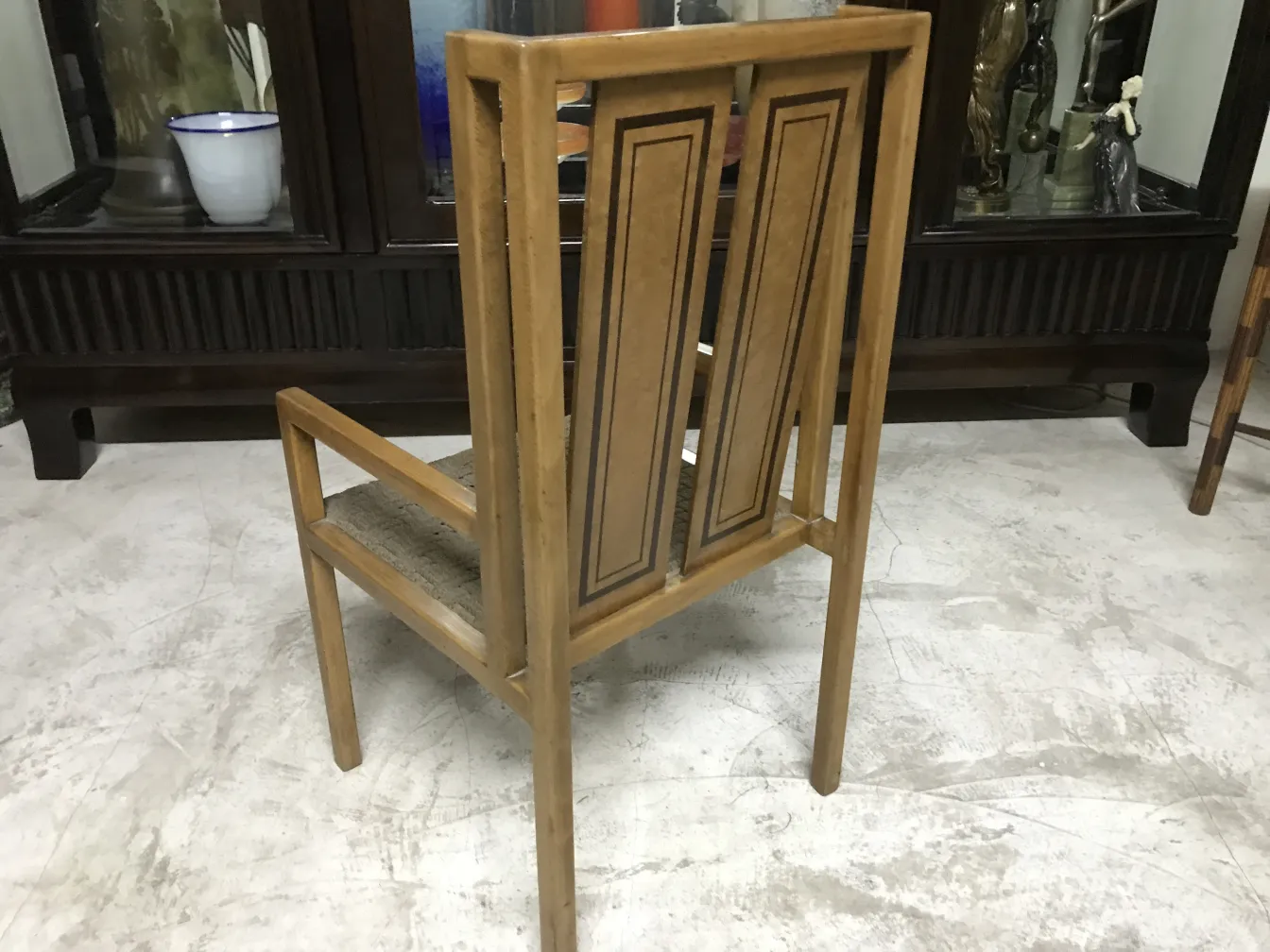 Antique desk chair with back design, elegant atmosphere.