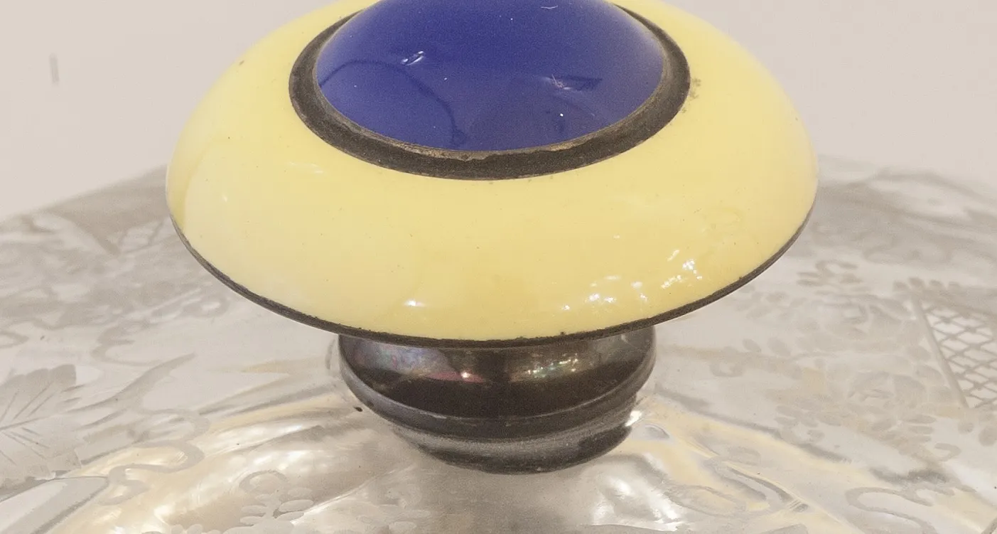 antique candy box with yellow and blue decorative lid