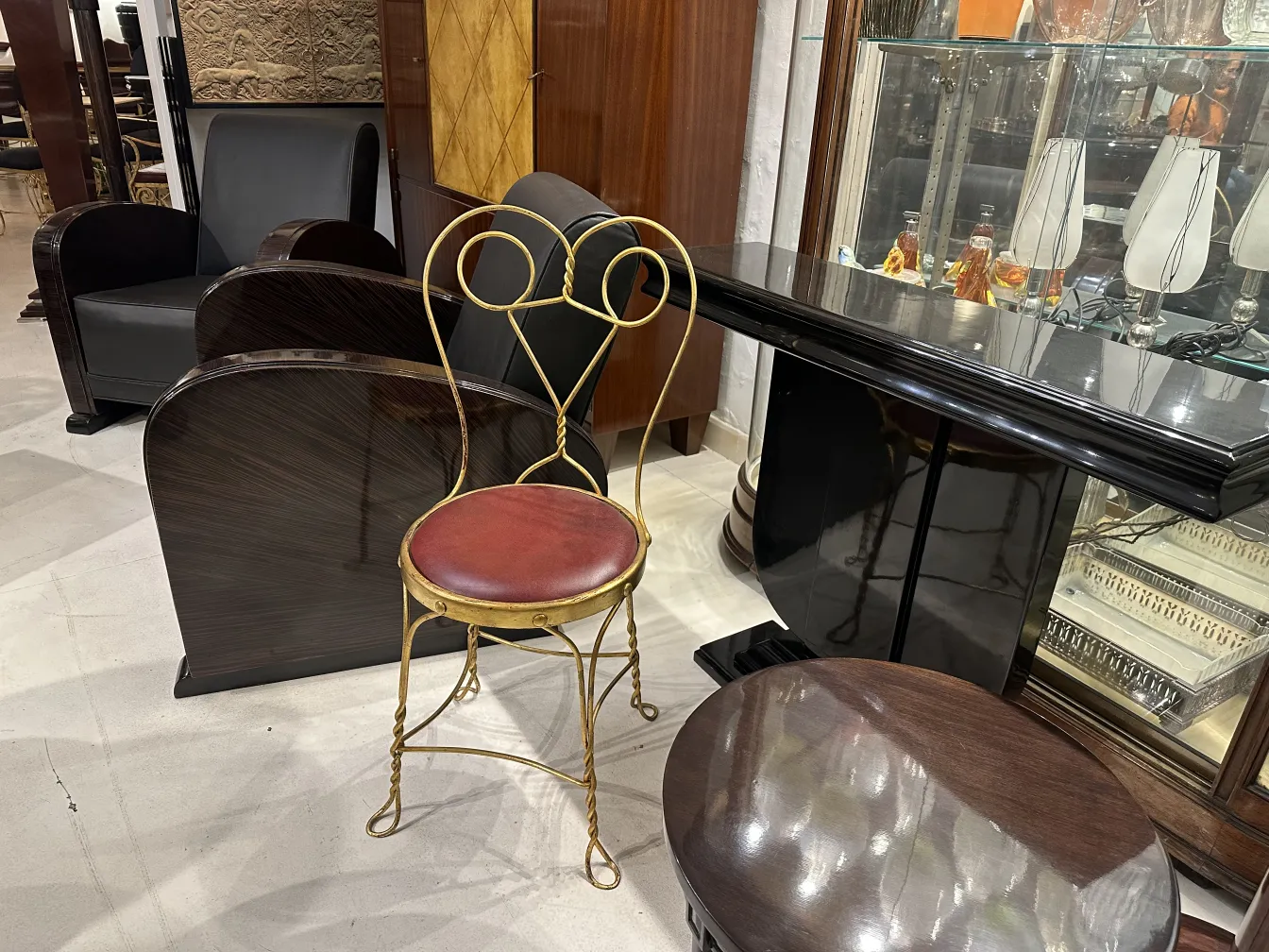 Four antique chairs in an elegant decorative setting