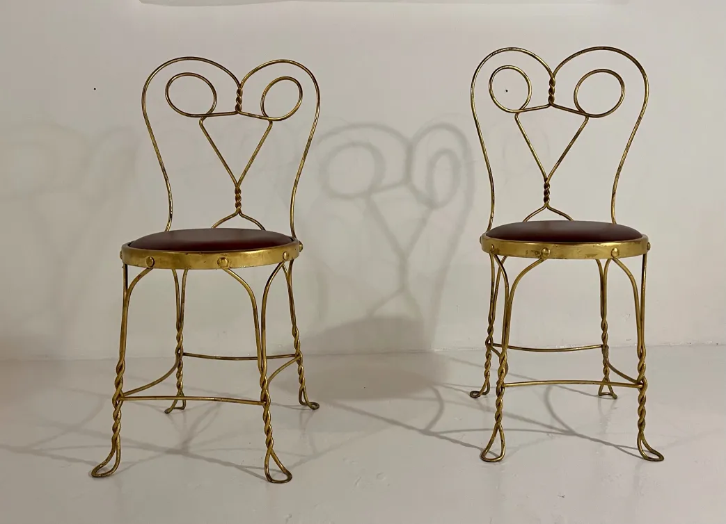 antiques four chairs in a minimalistic setting