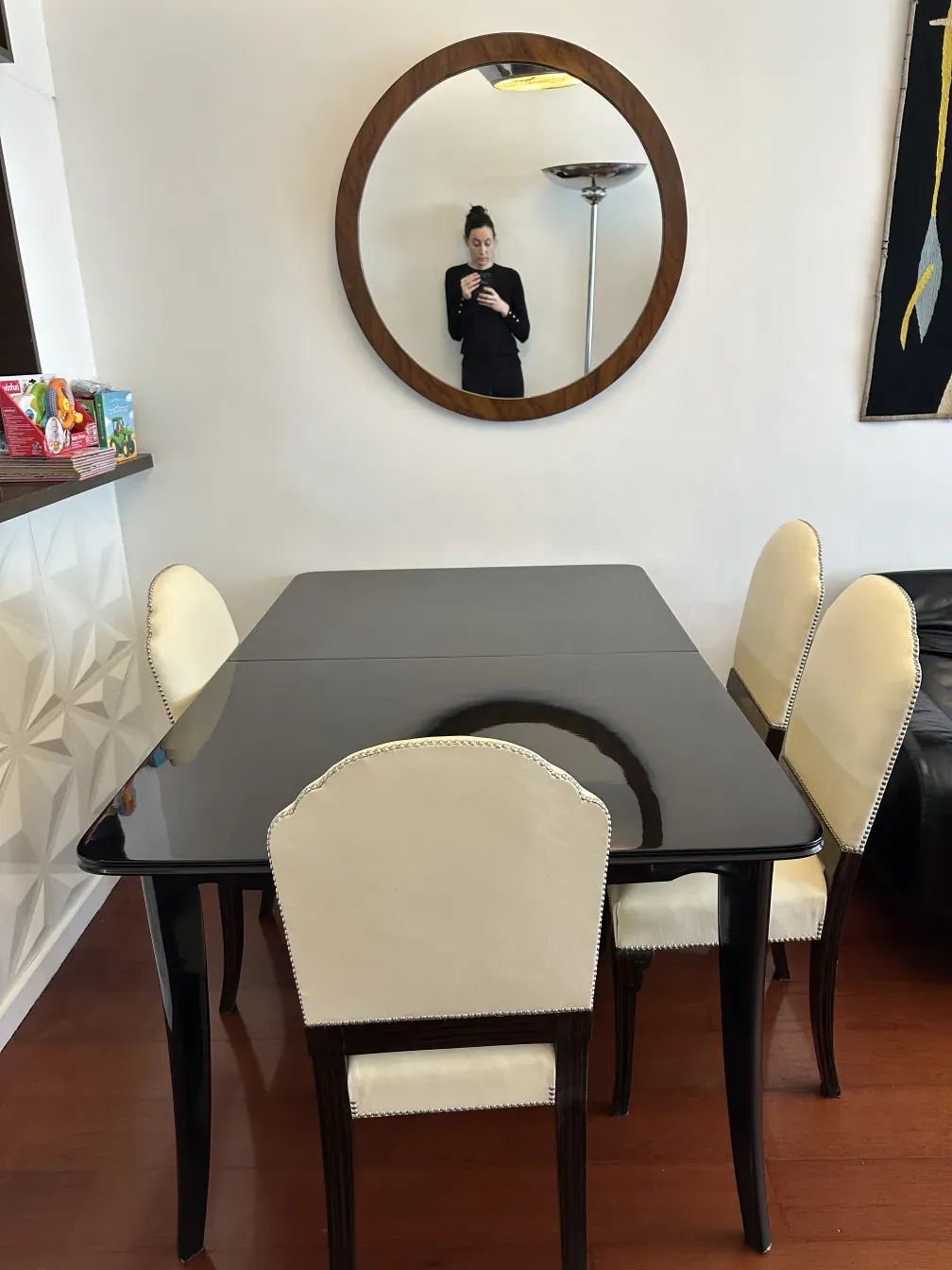 6 antique chairs in a modern dining room with mirror