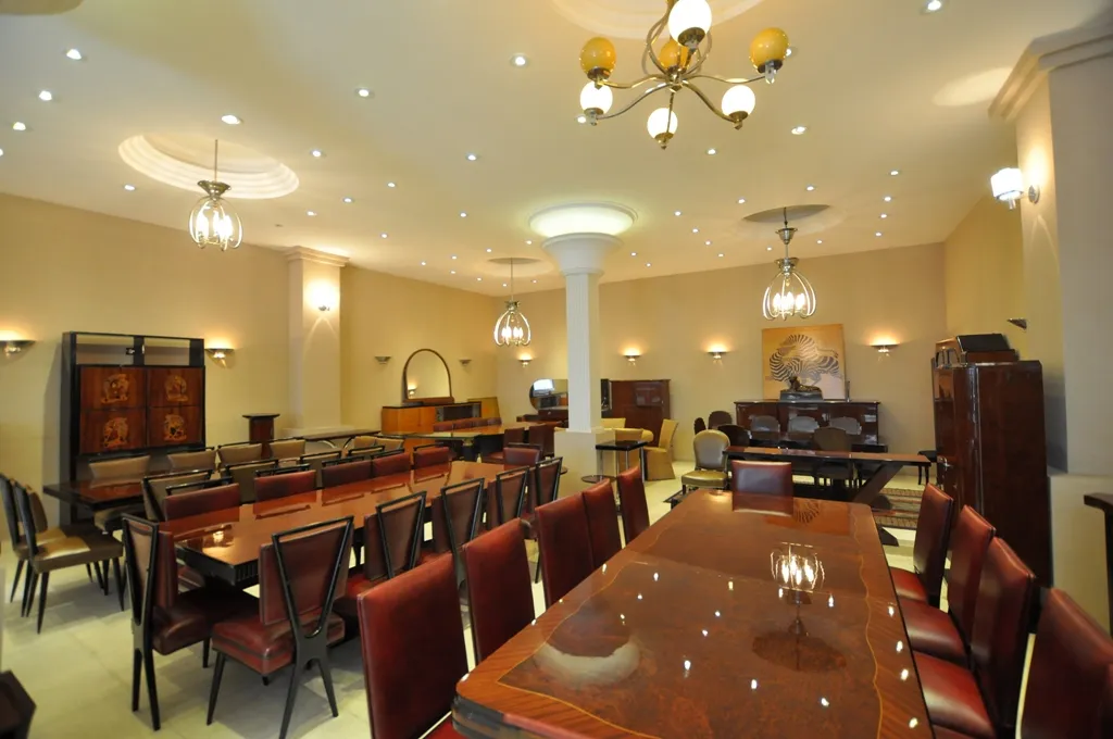 Twelve antique chairs in a spacious and elegant hall