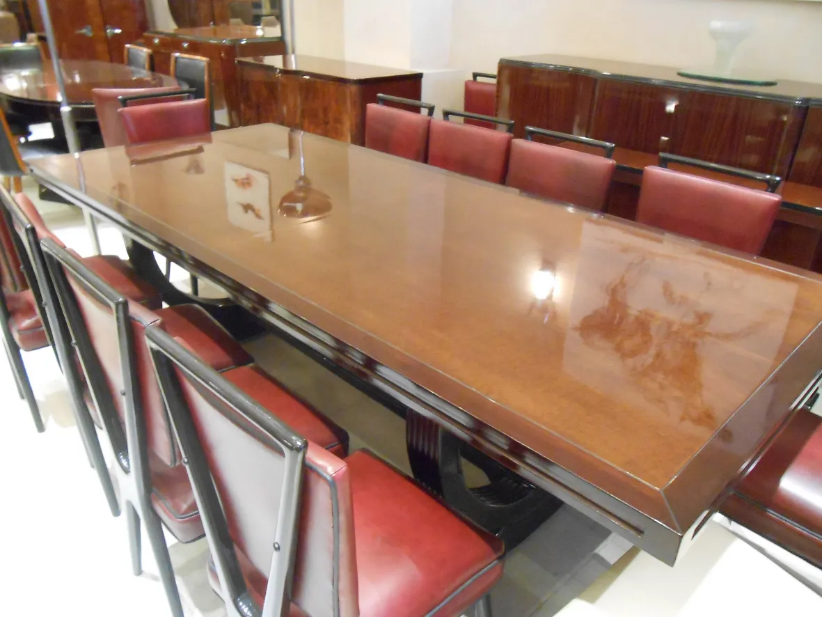 12 antique chairs around a dining table