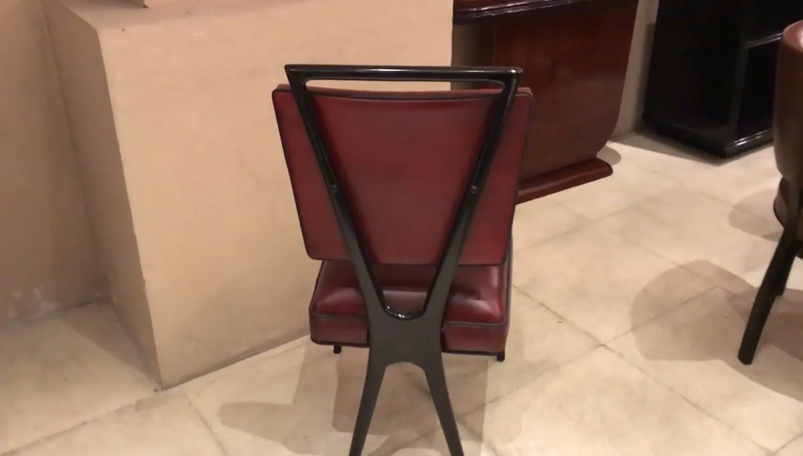 Back view of 12 antique chairs with unique design