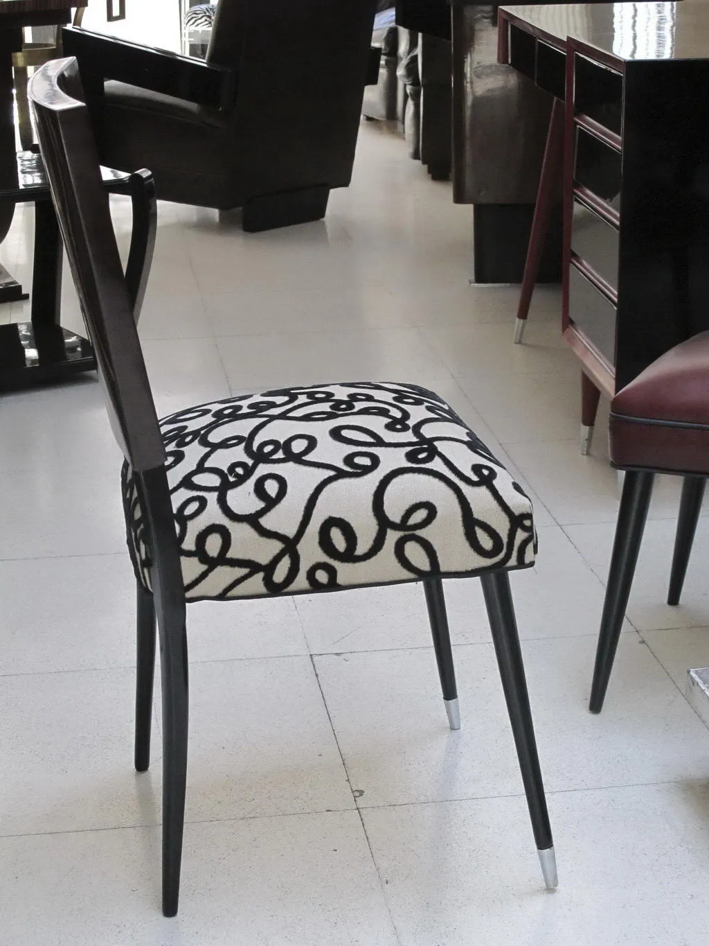 12 antique chairs with unique design in an elegant setting